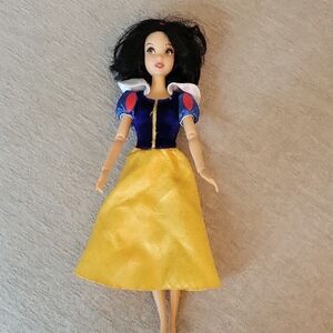 Disney 11" Snow White Doll with Blue and Yellow Dress.